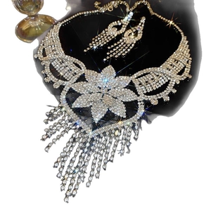 Elegant silver necklace and earrings set with crystal flower pendant and fringe tassel