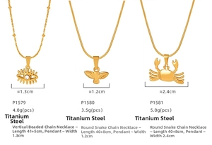 Three gold titanium steel necklaces with Evil Eye, bird, and crab pendants