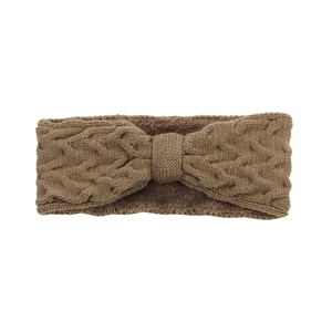 Detailed view of brown cable-knit headband with cozy plush lining and bow design