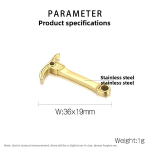 Polished stainless steel pickaxe pendant in gold finish showing 36x19mm dimensions