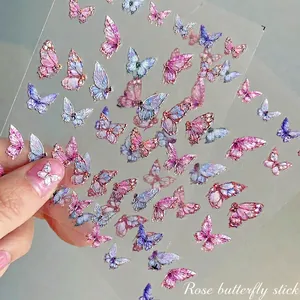 3D embossed butterfly nail art stickers with aurora laser finish and gold glitter accents