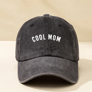 Vintage washed black cotton baseball cap featuring white COOL MOM embroidery for women