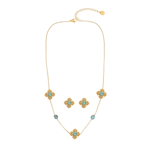 Vintage stainless steel jewelry set featuring turquoise pendants and flower charms