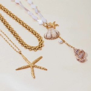 Gold stainless steel starfish and seashell layered necklace with white pearls and bold chain
