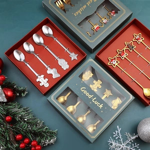 Christmas stainless steel spoon and fork gift set with festive charms in a premium box