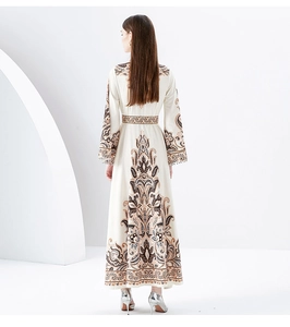 Back view of bohemian print maxi dress with floral patterns and a cinched waistline