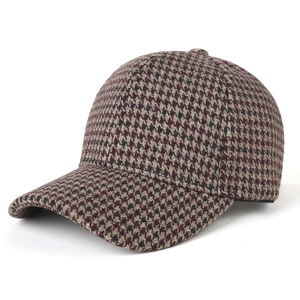 Classic houndstooth wool baseball cap in brown and white for outdoor autumn fashion