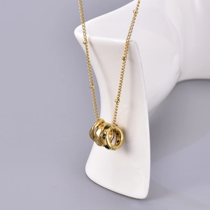 Elegant 18K gold-plated stainless steel necklace featuring three interlocking rings with gemstones