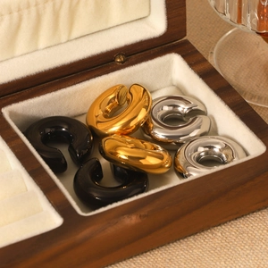 Classic hollow stainless steel C-shaped earring set in gold, silver, and black finish