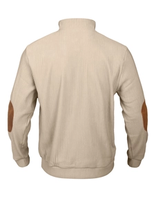 Macro shot of men's beige ribbed knit jacket featuring brown faux leather elbow patches