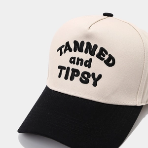 Two-tone baseball cap with TANNED and TIPSY 3D embroidery and adjustable strap