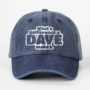 Detail of washed denim baseball cap featuring vintage white printed slogan lettering