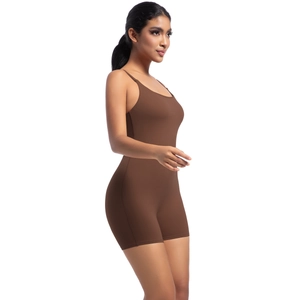 Side view detail of a coffee brown backless yoga romper with high elastic slimming fit