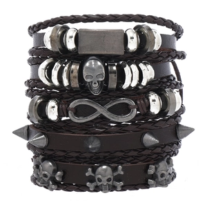 Men's punk leather bracelet set with skull and infinity charms on white background