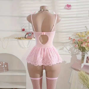 Detailed back view of pink lace babydoll lingerie set with bow tie and mesh stockings