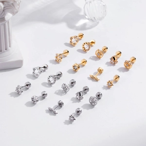 Ensemble de boucles d'oreilles en acier doré et argenté avec motifs d'étoiles et fleurs
