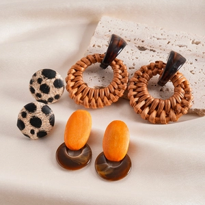 Set of 3 Bohemian resin wood and rattan hoop earrings on elegant silk fabric