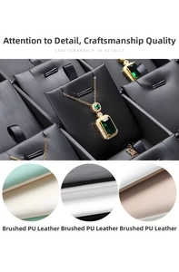 Close-up of black brushed PU leather texture on professional jewelry necklace display tray