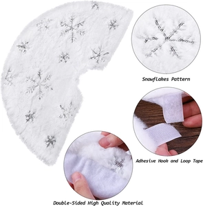Detail of white faux fur Christmas tree skirt with silver sequins and hook loop tape