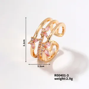 Detail view of multi-layer gold butterfly ring with pink zircons and size dimensions
