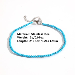 Minimalist stainless steel turquoise bead anklet with extension chain on white background