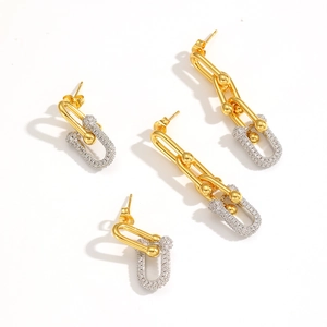 Modern U-shaped link earrings in gold and silver finish with crystal pavé setting