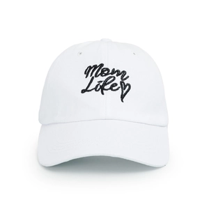 Detailed view of Mom Life black embroidery and heart on a white cotton baseball cap