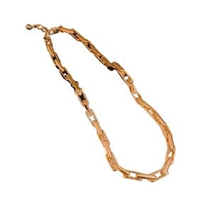Minimalist gold chain link necklace with adjustable lobster clasp on white background
