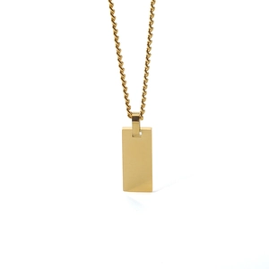 Minimalist gold rectangular pendant necklace with a spiral chain on a white background