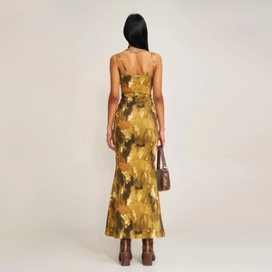 Detail of camouflaged back view showing adjustable straps and slim fit long dress