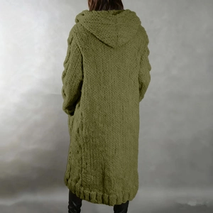 Close-up of grass green chunky knit long cardigan featuring cable-knit sleeve details