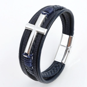 Detail of dark blue multilayer leather bracelet featuring silver cross and magnetic clasp