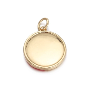 Detail of a round golden pendant with starry sky oil drop design on a white background