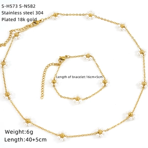 Detailed specs of 18k gold plated stainless steel pearl daisy necklace and bracelet set
