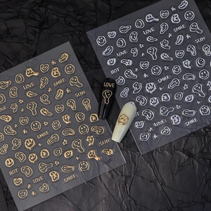 Golden and silver 3D melting smile nail stickers with metallic relief effect