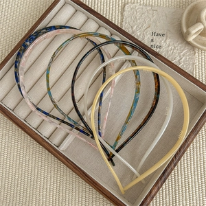 Slim acetate headbands with anti-slip teeth in tortoise shell and marble patterns