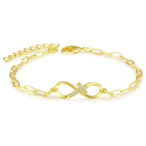 Detailed view of infinity cross bracelet with gold plating and sparkling zircons