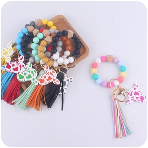 Western style silicone bead keychain bracelet with cow charm and colorful long tassel