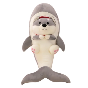 Funny shark-dog plush toy with grey shark head and cute Shiba Inu inside on white background