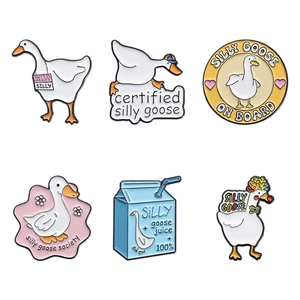 Set of 6 cute Silly Goose enamel pins featuring cartoon duck and milk box designs