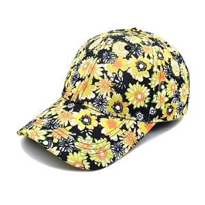 Floral print baseball cap for women with yellow and orange flowers on black canvas