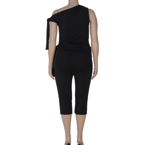 Back view of a black one-shoulder slim fit top and shorts set on a mannequin