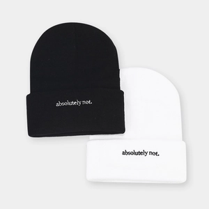 Black and white knit beanies with embroidered absolutely not text in a minimalist style