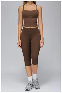 Front view of a dark brown yoga set featuring a square neck tank top and high-waist capri leggings