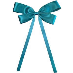 Elegant turquoise silk satin oversized bow hair clip with long tails on white background