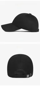 Detail view of winter baseball cap showing metallic logo and adjustable back metal buckle