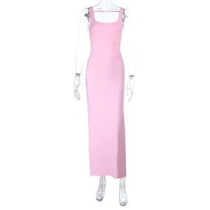 Detailed back view of a pink backless dress with a bow on a transparent mannequin