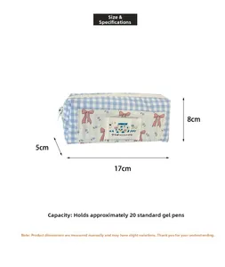 Blue plaid canvas pencil case with cute bow patch and durable zipper closure