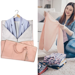 Detail of pink PU leather travel garment bag with suit storage and folding design