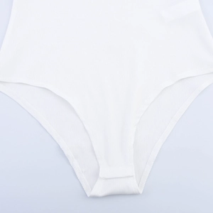 White ribbed knit bodysuit for women featuring elegant lace trim and a slim fit design
